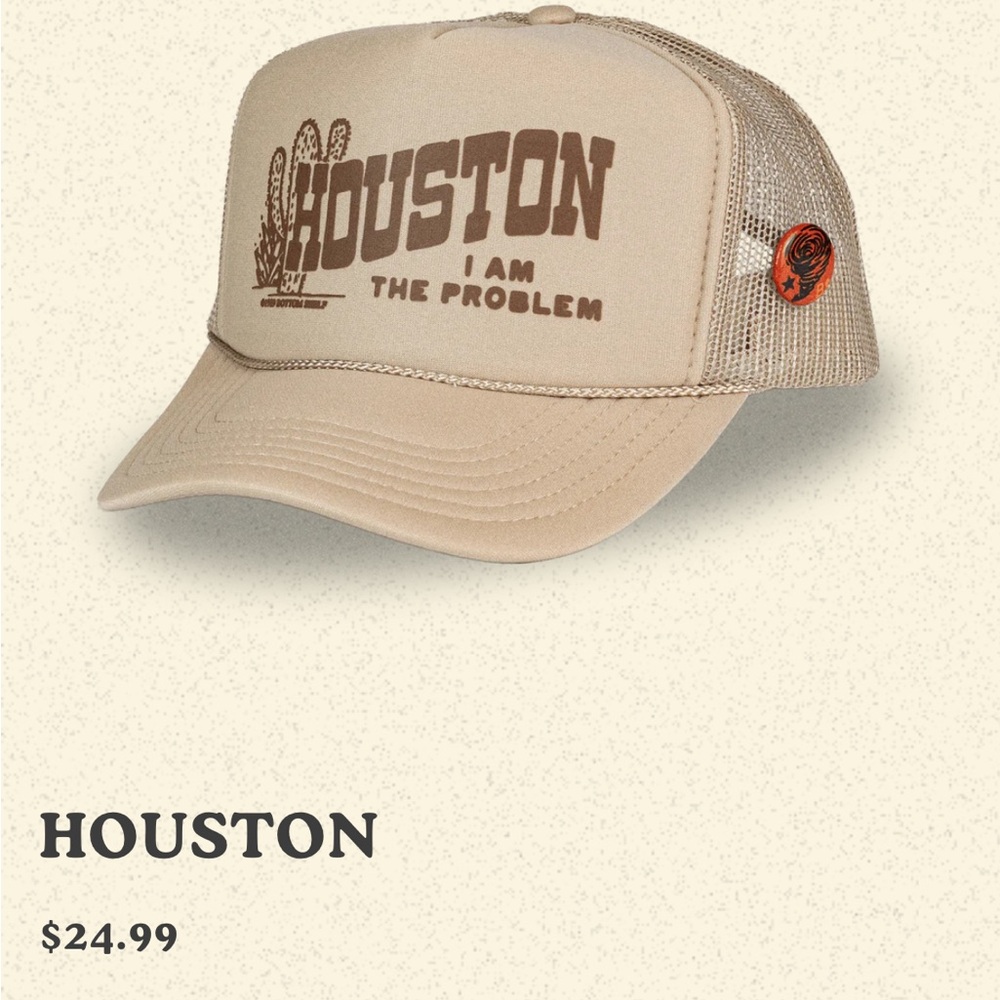 Bottom Shelf Houston I am the problem trucker hat. Biege.